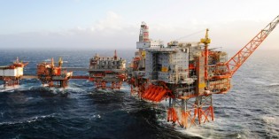 North Sea oil platforms evacuated as drifting barge nears in rough seas