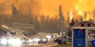 Evacuation of 80,000 Fort McMurray residents impeded as wildfire rages