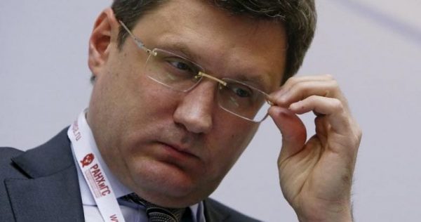Russian Energy Minister Alexander Novak adjusts his glasses during a session of the Gaidar Forum 2016 "Russia and the World: Looking to the Future" in Moscow, Russia, January 14, 2016. REUTERS/Sergei Karpukhin