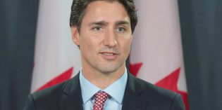 Canada unveils national carbon price, Alberta demands pipeline in return