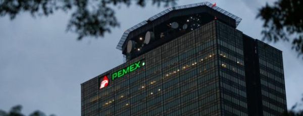 Pemex sharply reduces losses as oil prices rise