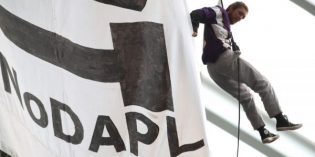 Protesters hang banner during NFL game to protest Dakota Access pipeline